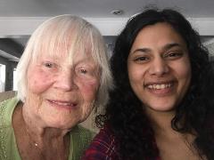 Older adult volunteer with her student