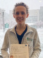 Katie Barker Katie Barker holding report