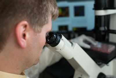 BenMMicroscope4 Lab Tech looking in microscope