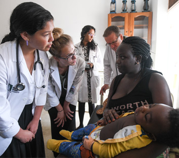 Examining patient at St. Stephen's