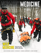 Vermont Medicine cover Spring 2023 wilderness rescuers in snowy woods