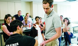 Faculty demonstrating to students