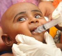 Dhaka baby receiving oral vaccine