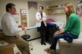 young adult in exam room