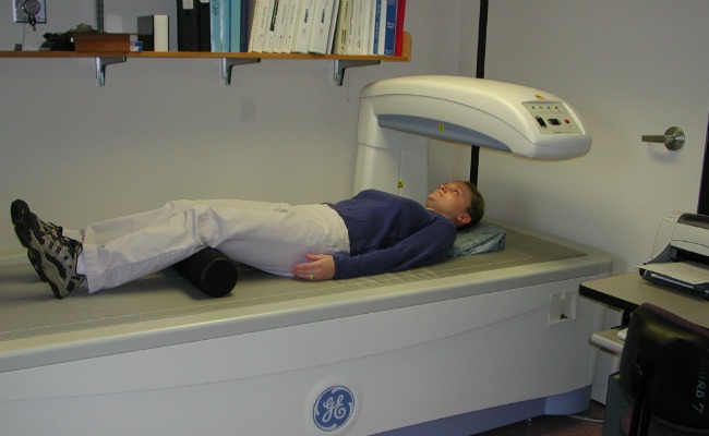 dexa1 Person lying under Dexa Scanner