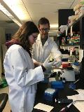 Dr. Tharp instructing a student Dr. Tharp instructing a student