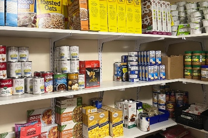 Food cans and boxes in a pantry