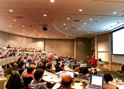 Students in a classroom listening to lecture