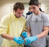 Photo of Justin Van Backer during a suturing clinic