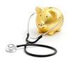 piggy bank with stethoscope