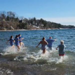 Larner community members participating in the "Penguin Plunge"