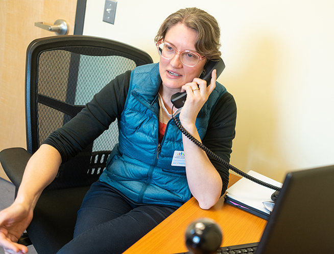 Greta Spottswood, M.D.'11, M.P.H., in her VTCPAP office at Burlington’s Community Health Centers.