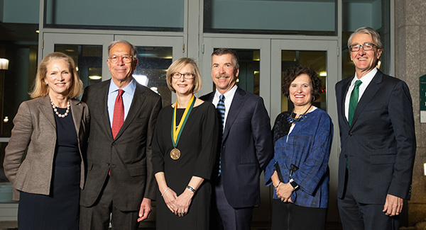 Davidson Investiture Janet Carroll, Dr. Schapiro, Dr. Davidson and her husband, Mark Mulder, Provost Prelock and Dean Page stand outside the Larner Health Science Research Facility.